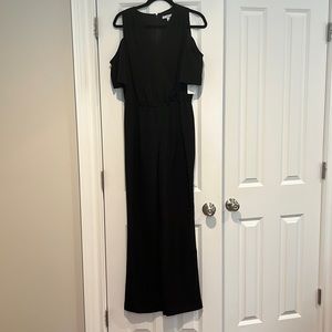 Womens jumpsuit. Size 6. New with tag. Black
